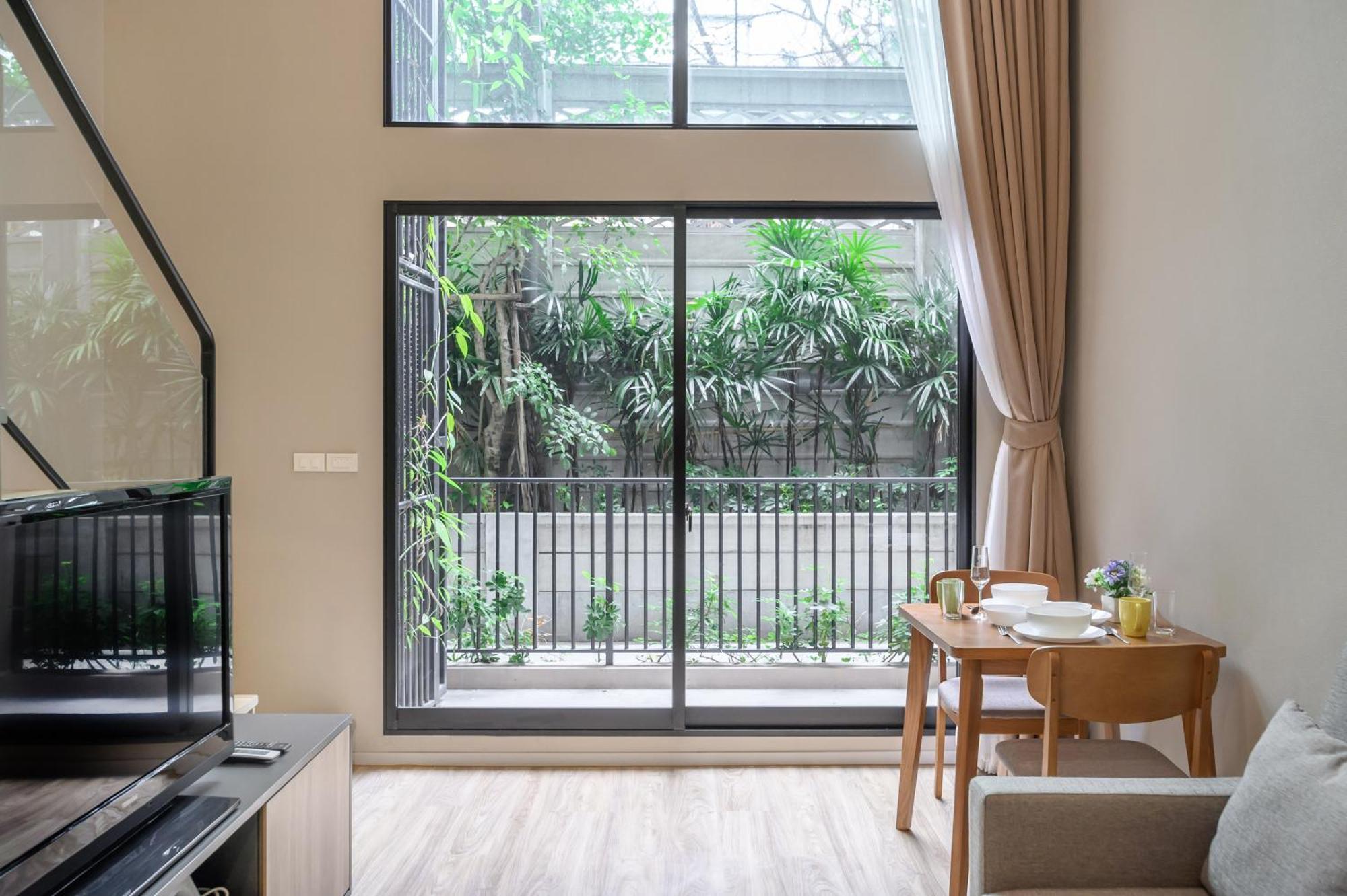 Apartamento Blossom Sathorn By Plearn Bangkok Habitación foto